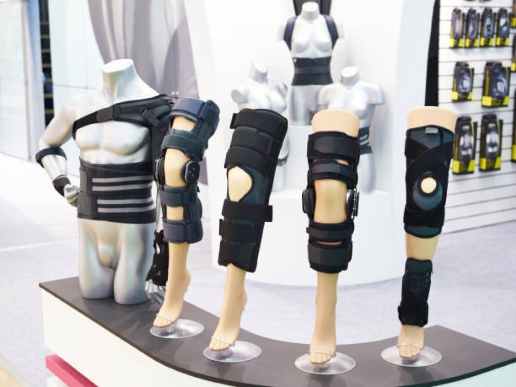 Brace on the knee joint with a sleeve made of neoprene in store